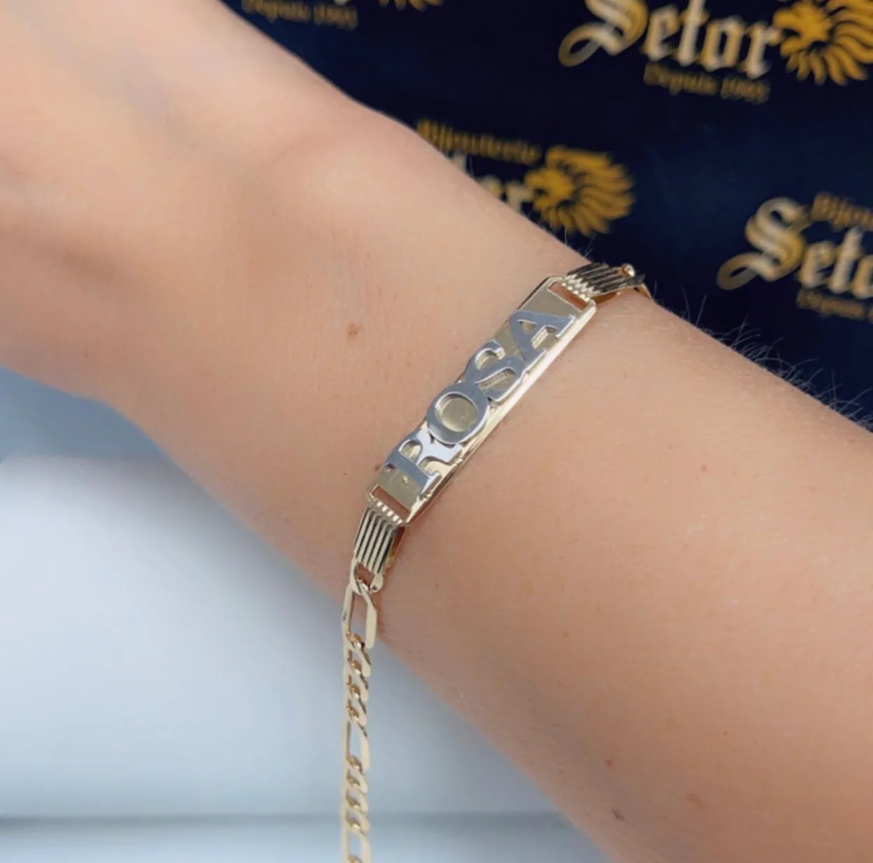 Elevated name bracelet