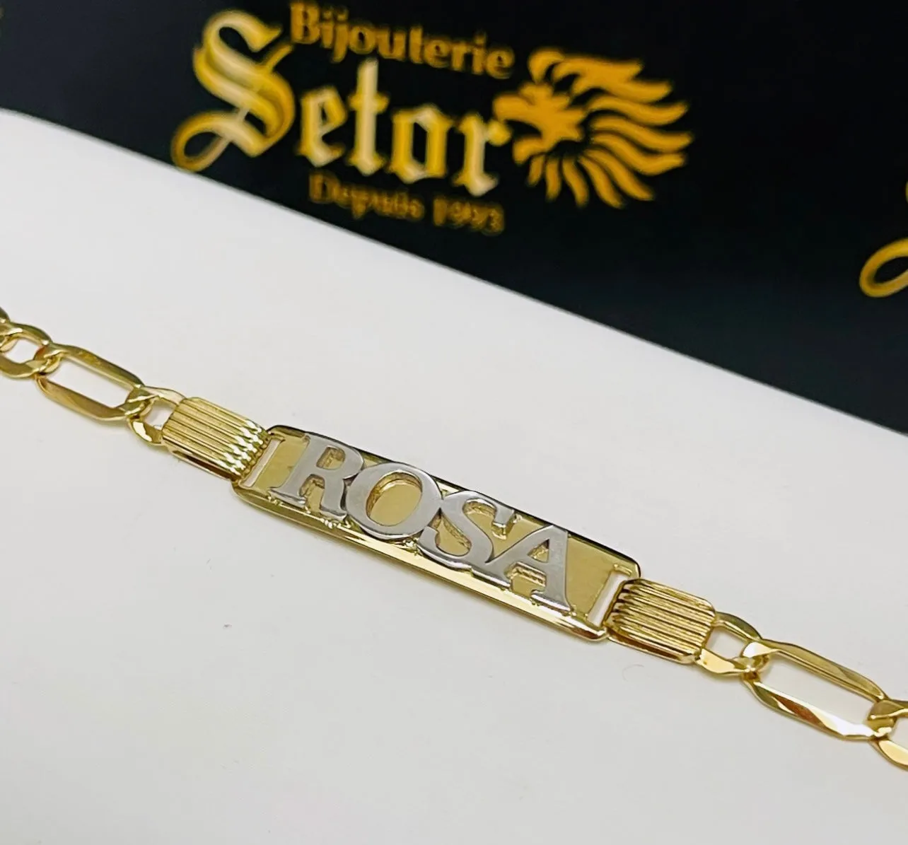 Elevated name bracelet